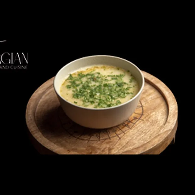 Bowl of creamy Georgian chikhirtma chicken soup